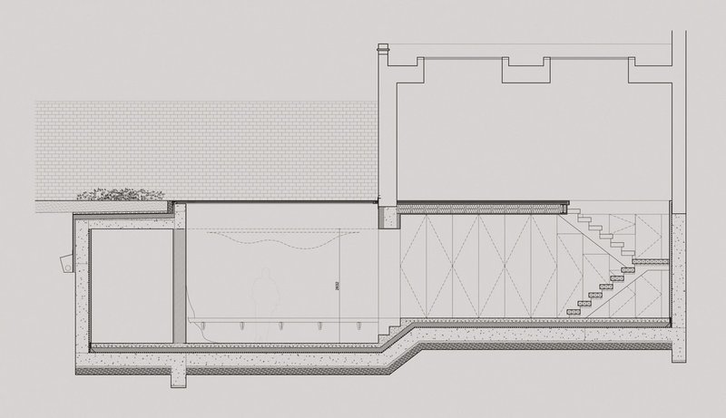 Walk-on rooflights and a small sunken courtyard admit daylight which is reflected through the interior by carefully selected materials and sculptural features.