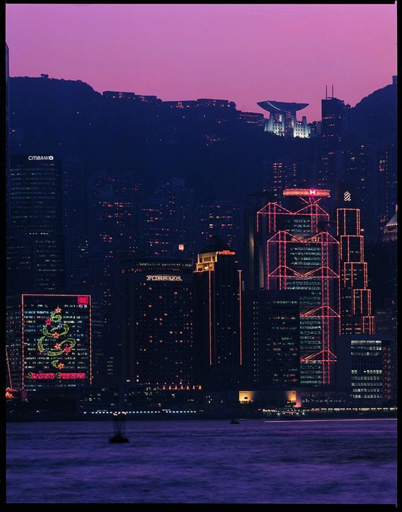 Brits in Hong Kong: Foster’s HSBC headquarters, 1979-86 (foreground), is overlooked by Farrell’s Peak Tower, 1991-95.