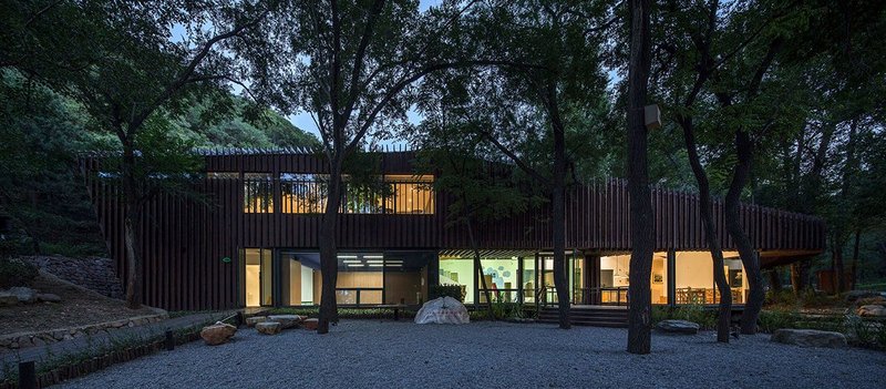 Badaling Forest Experience Center, Beijing. Great care was taken to design around the trees on the site rather than remove them. Photo: Zhangyong. © Courtesy of BCKJ Architects