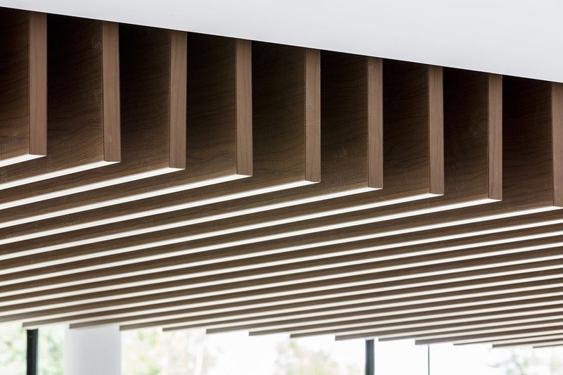 Armstrong has installed wood-effect metal baffles at BPR's refurbishment of Blake House in Uxbridge.