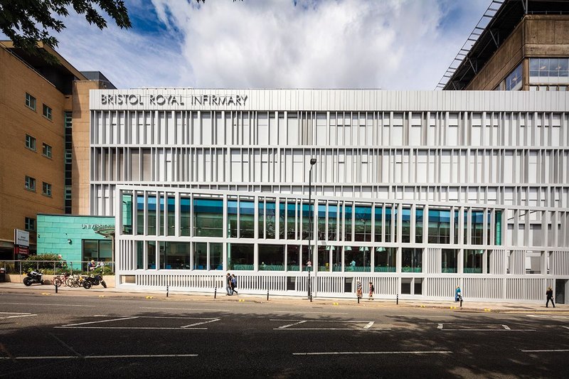 The reclad peels away on the three lowest levels to encapsulate Capita’s recent welcome building, which was built and funded separately but almost simultaneously.