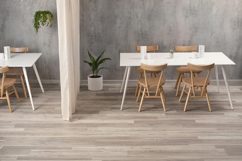 Natural calmness via the wellbeing benefits of biophilic design: Washed Salvaged Timber SS5W3322 luxury vinyl tiles in Boardwalk laying pattern, Spacia Woods range, Amtico.