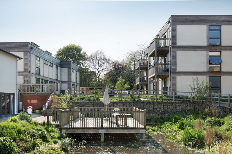 Low Impact Living Affordable Community (LILAC) in Leeds was able to prioritise pedestrian and child-friendly spaces, as designed by White Architecture.