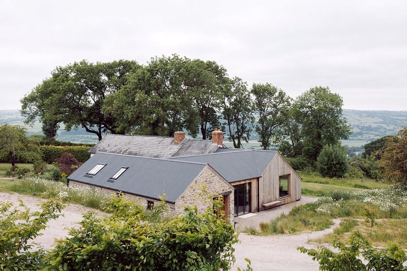 Nidus Architects used local larch as cladding for its Pen-y-Common retrofit and extension.