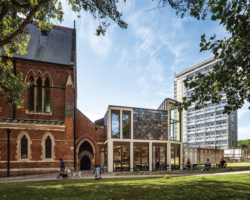 By the once-barricaded north door, St Mary Paddington now has a welcoming café, one of the front entrances  for the scheme.