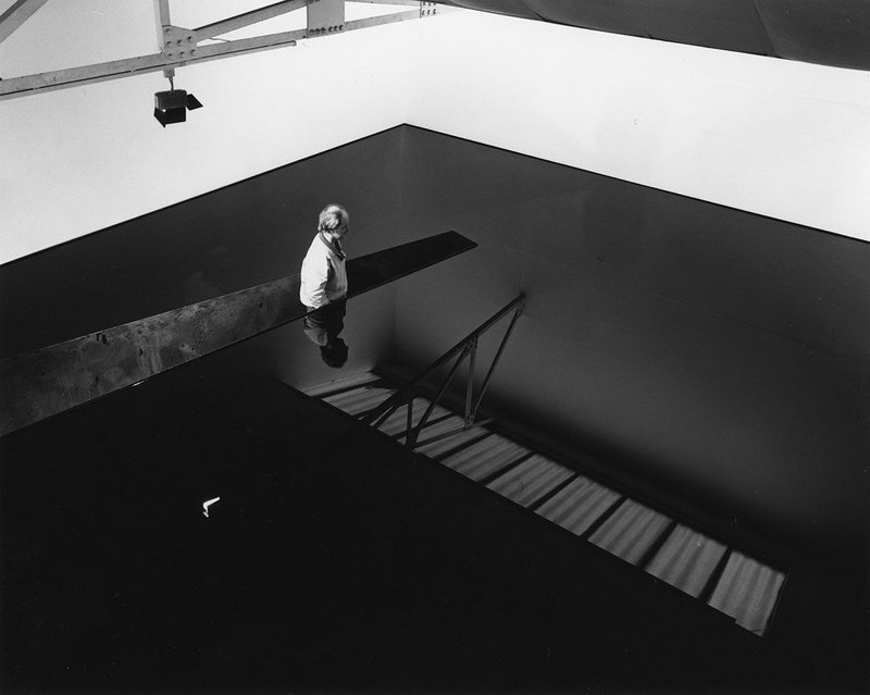 Richard Wilson, standing in the original installation of 20:50, Matt’s Gallery, London, 1987.