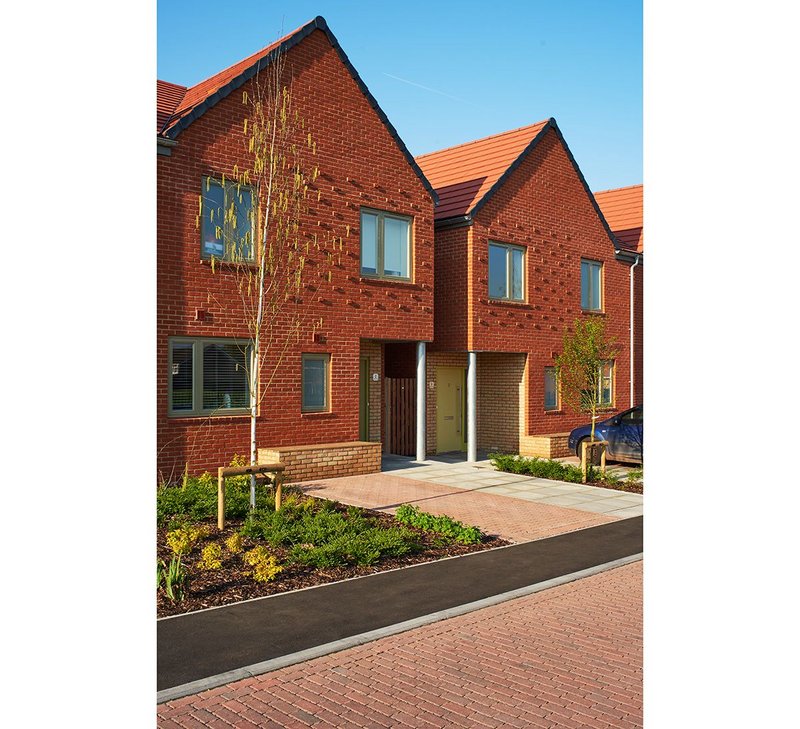 The basic brick backdrop of Umpire View by Sarah Wigglesworth Architects is added to by a projecting brick pattern on the gables.