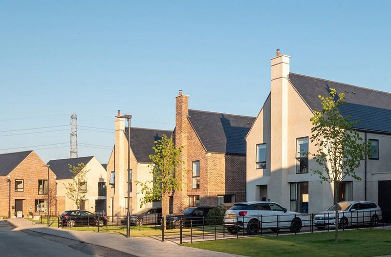 Somerbrook housing options in brick, roughcast render and walling stone, specified and supplied by Taylor Maxwell.