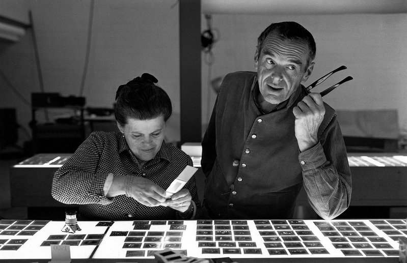 Charles and Ray Eames selecting slides.