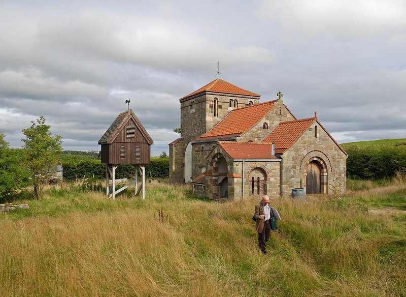 The chapel of Shepherd’s Law in Northumberland recalls an earlier age and is still a work in progress. Architect Ralph Pattisson paces out the site. To the left is the incomplete but functioning bell tower.