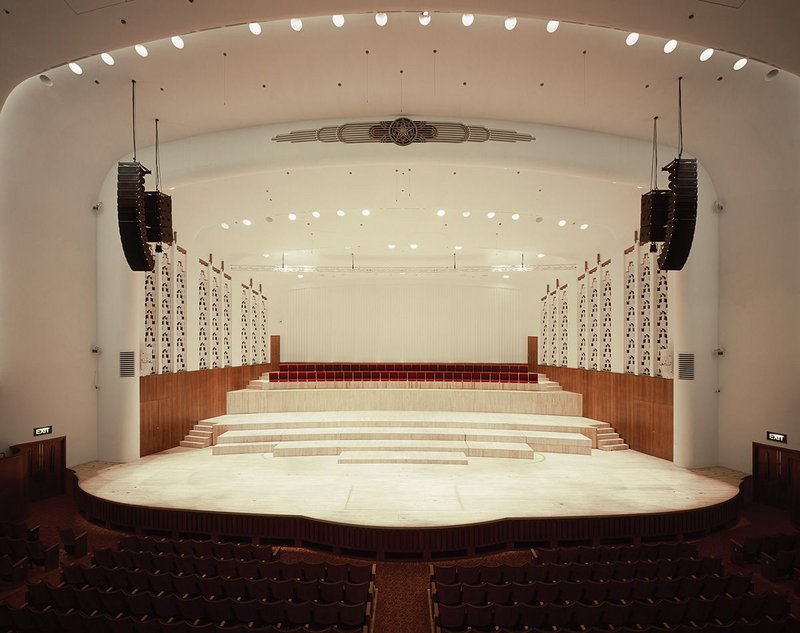 Caruso St  John’s work tuning and air conditioning the concert hall and mechanising the staging is almost invisible.