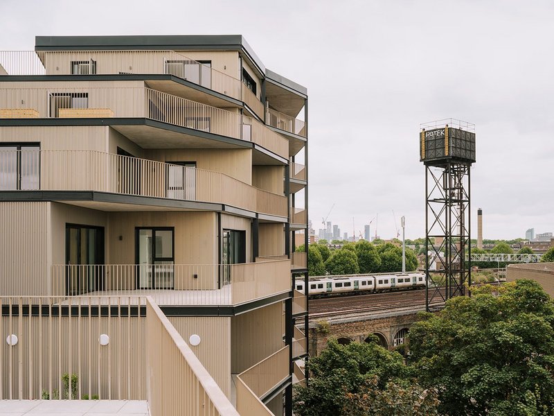 Access galleries overlook a planted roof terrace.