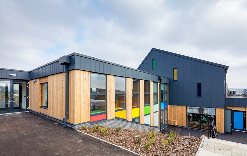 Velfac composite glazing at Greentrees Junior School in Salisbury, Wiltshire by Kendall Kingscott architects. The windows feature natural internal timber frames and durable external aluminium cladding.