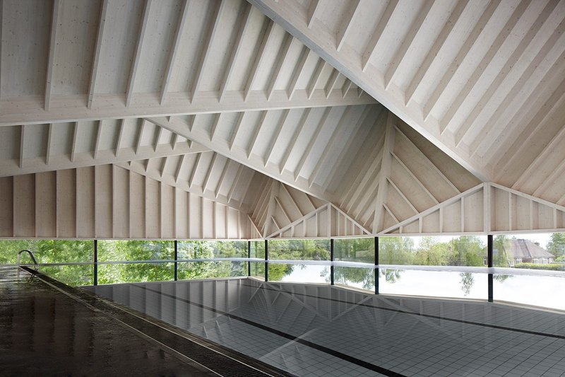Cowley Timber developed the bespoke system for the sculptural timber roof of Alfriston school swimming pool, designed by Duggan Morris Architects.