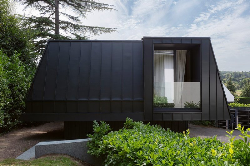 The dark exterior contrasts with the light found within.