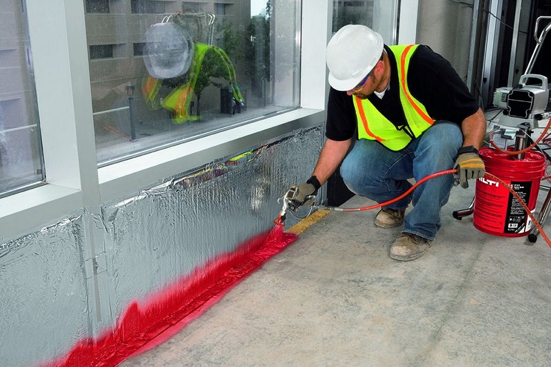 Hilti’s CFS-WB Firestop joint spray, sealing perimeter gaps between floor slabs and curtain walling systems or wall junctions with soffits of concrete or composite slabs.