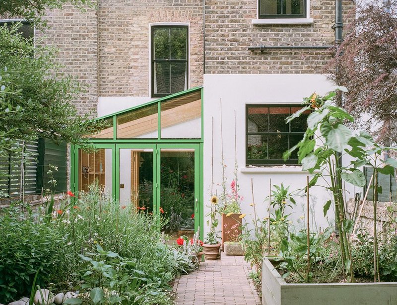 The May Green glass extension at Green House in Hackney, designed by [Y/N] Studio.
