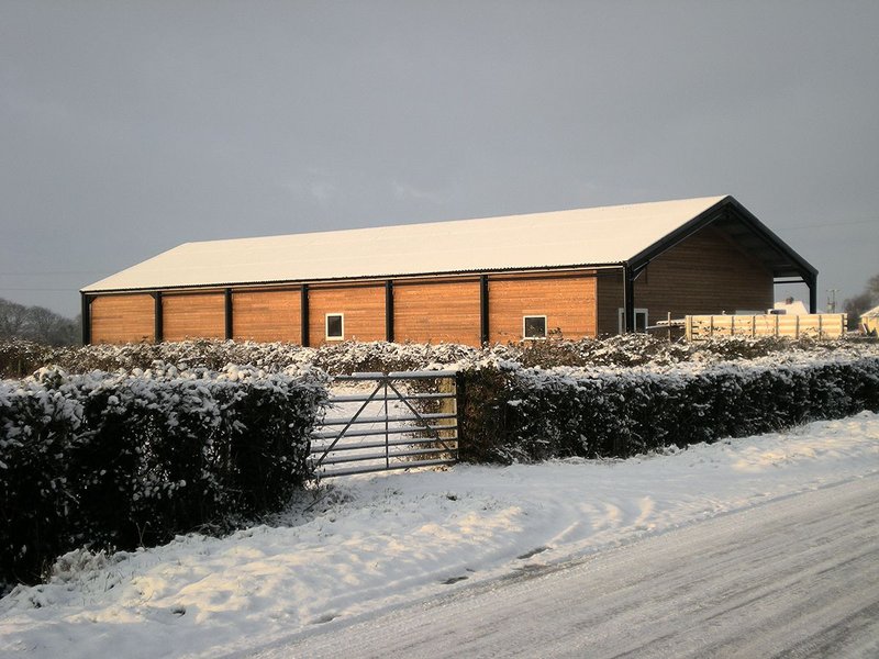 The completed Burtle village hall was initiated and self-built by local people.