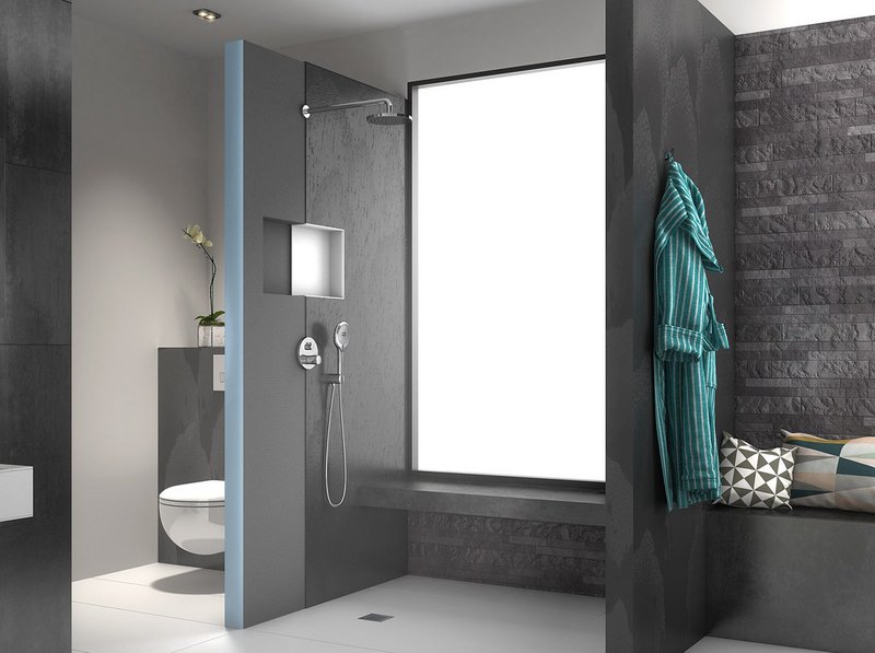 Wedi Sanwell shower wall module with integrated pipes, Hansgrohe iBox and niche finished with Wedi Top Wall in Carbon Black and Wedi Sanwell Top in Pure White.