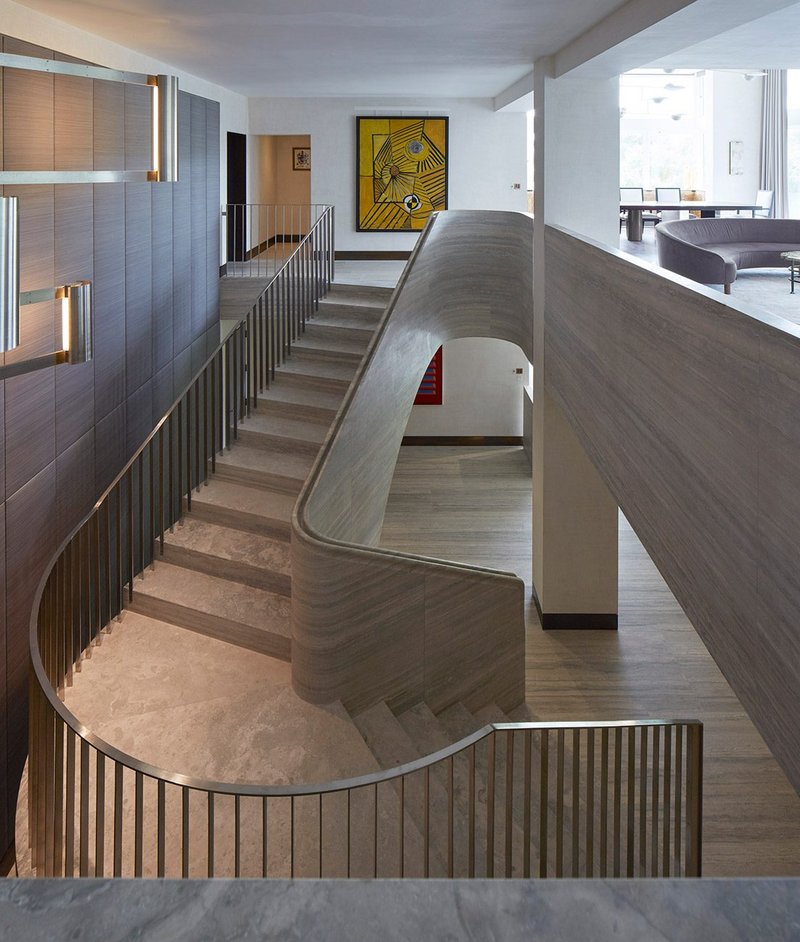 Completed travertine stair designed by Jamie Fobert Architects for a residence in central London.