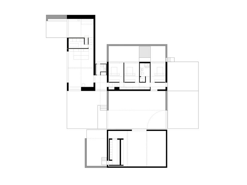 Plan showing the L-shaped house forming an entrance courtyard with the existing barn.