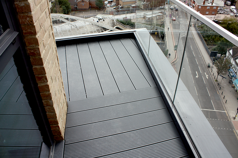 The Ryno non-combustible aluminium decking system on a balcony and terrace at Peabody's Williamson Heights in Wembley, London.