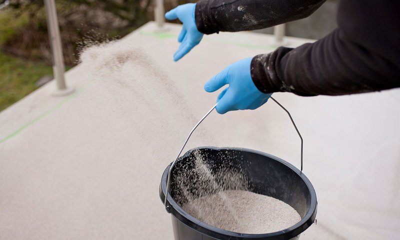 An anti-skid surface being applied to BMI Sealoflex Endura.