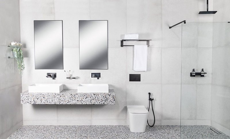 Stratos countertop washbasins with Zephyr mixer taps, WC and showerhead, the Bagnodesign collection, Sanipex Group.