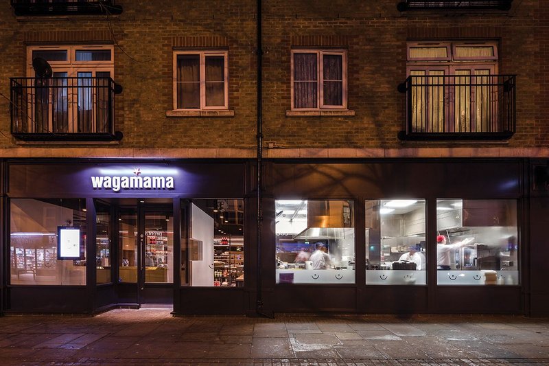 Kitchen activity is clearly visible from the street in Wagamama’s new restaurant at Uxbridge, designed by Black Sheep.