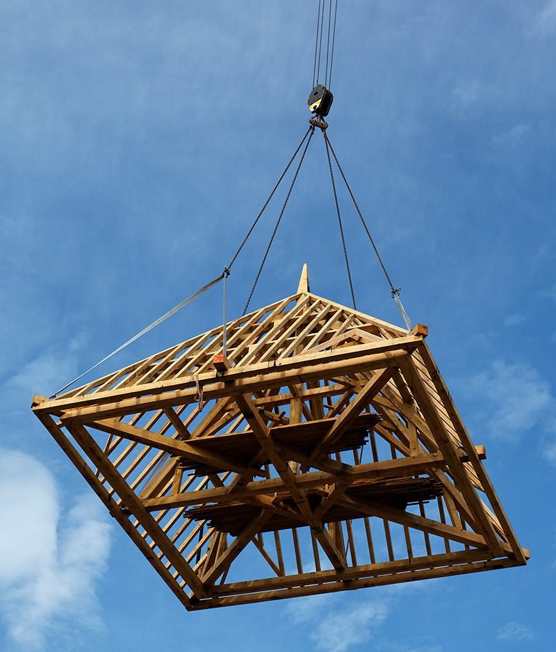 Craning a roof into place can save hours on site. But innovation and modern methods need to be applied more generally in the construction industry.