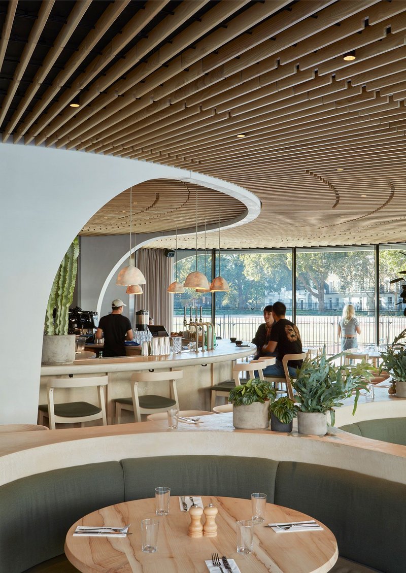 A warm ash ceiling radiating out from the quartz concrete core sets the stage for Nex’s version of café society.