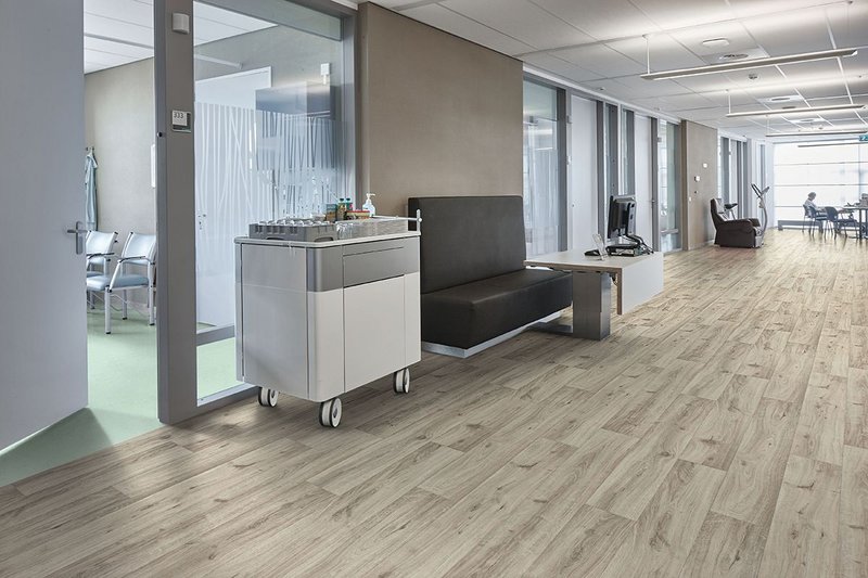 Forbo's new Eternal collection offers  an extensive range of finishes, all with realistic wood effects, stone and abstract designs. Eternal Colour in Aqua 40562 and Eternal Wood in Cream Oak 10842.