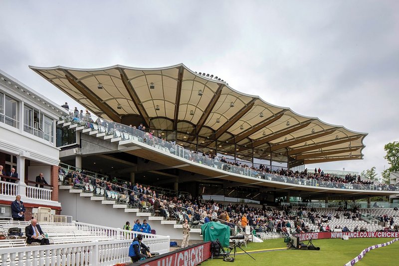 At the opening match the view into the Warner Stand from the pitch shows the simple continuity of what is apparently a single roof when seen from below.