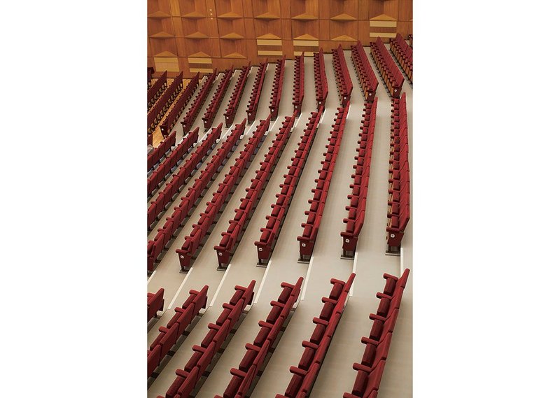 Refurbished seats and acoustic panels of Japanese oak in the concert hall.