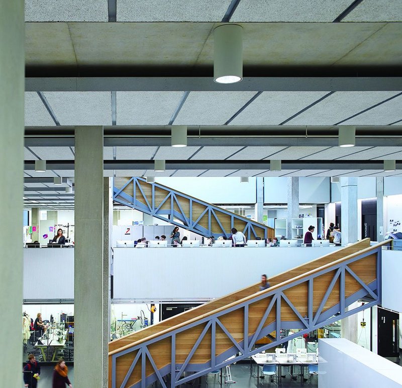 The staircases and walkways show their workings with the structure but encase students in high timber sides – here in the ‘factory’ space.