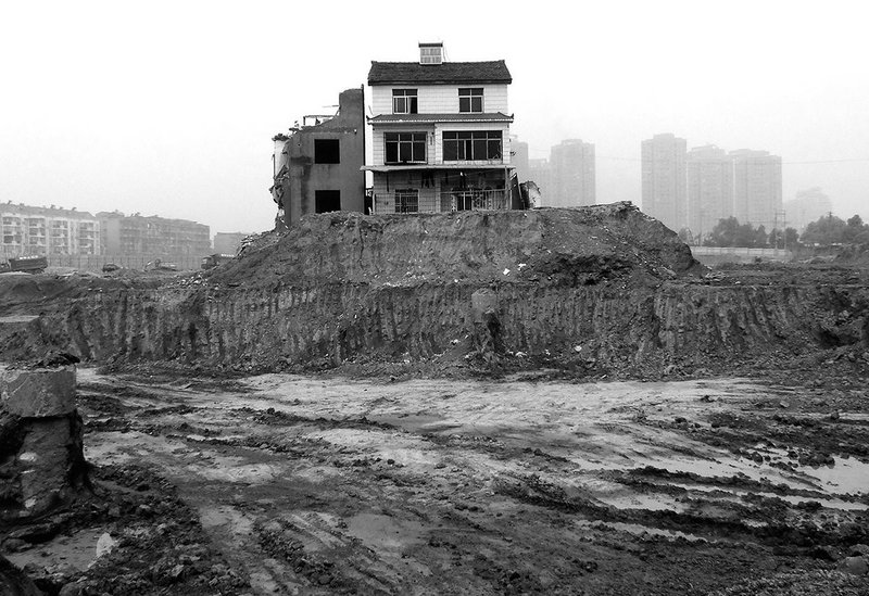 ‘Nail house’ marooned in Yichang, China, 2013.