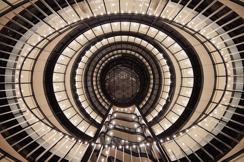 Looking up into the new, circular atrium space at Hopkins Architects’ 100 Liverpool Street.