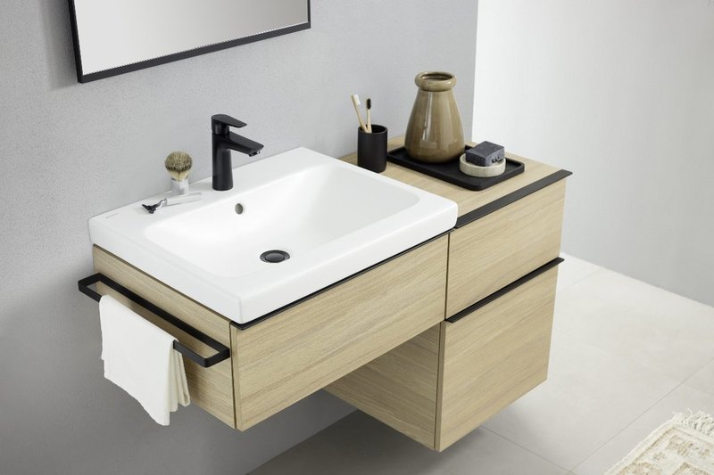 Geberit iCon washbasin in White Satin finish with iCon modular furniture in Oak wood-textured melamine.