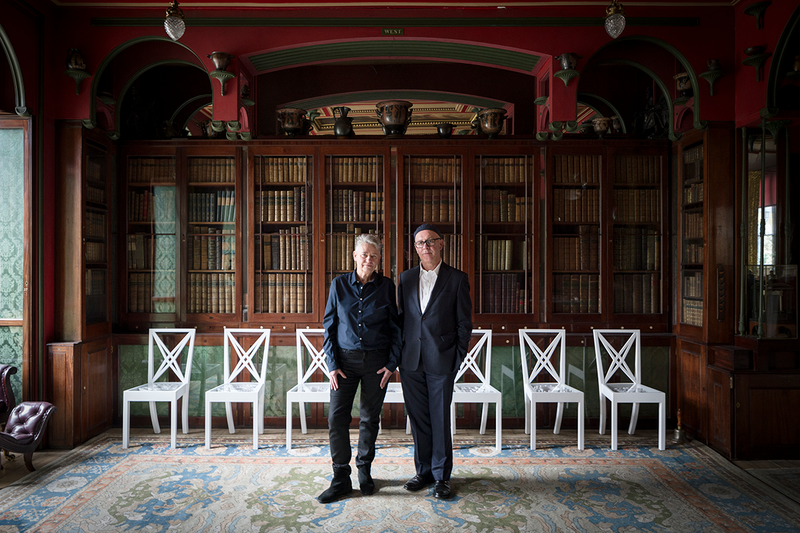 Langlands & Bell in the Library Dining Room at Sir John Soane’s Museum with their artwork Grand Tour 2020 in the background, from Langlands & Bell - Degrees of Truth.