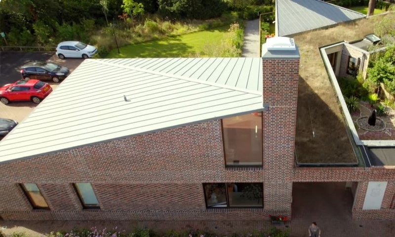 Quartz-Zinc standing seam roof at Stirling Prize winner Mae Architects' John Morden Centre, Blackheath.