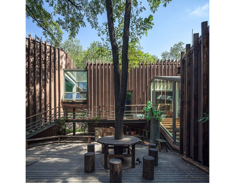 Badaling Forest Experience Center, Beijing. Colours were chosen that were similar to the trees and soil to help the building blend into its setting. Photo: Zhangyong. © Courtesy of BCKJ Architects