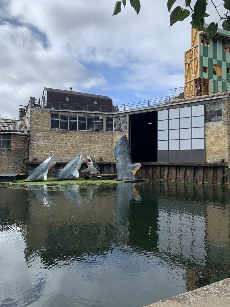 Jaimie Shorten’s SHARKS!, this year’s Architecture Foundation and Shiva Antepavilion, awaits the addition of the fifth and final member of its shark ensemble.  Above to the right is last year’s pavilion, Potemkin Theatre, designed by Maich Swift Architects.