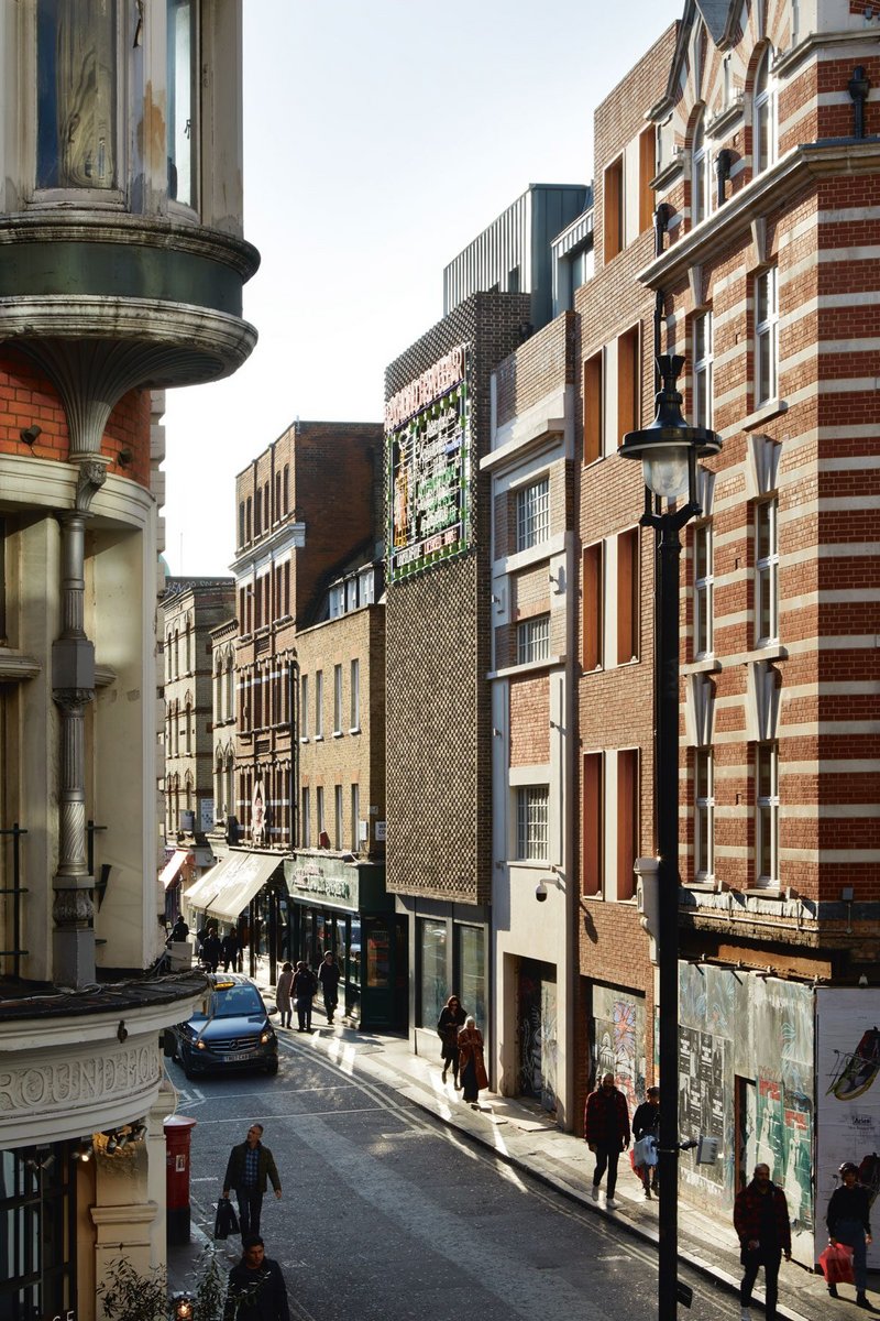 Brewer Street frontages respect the narrow plot widths of the district with a mix of retained and overclad facades and new-build.