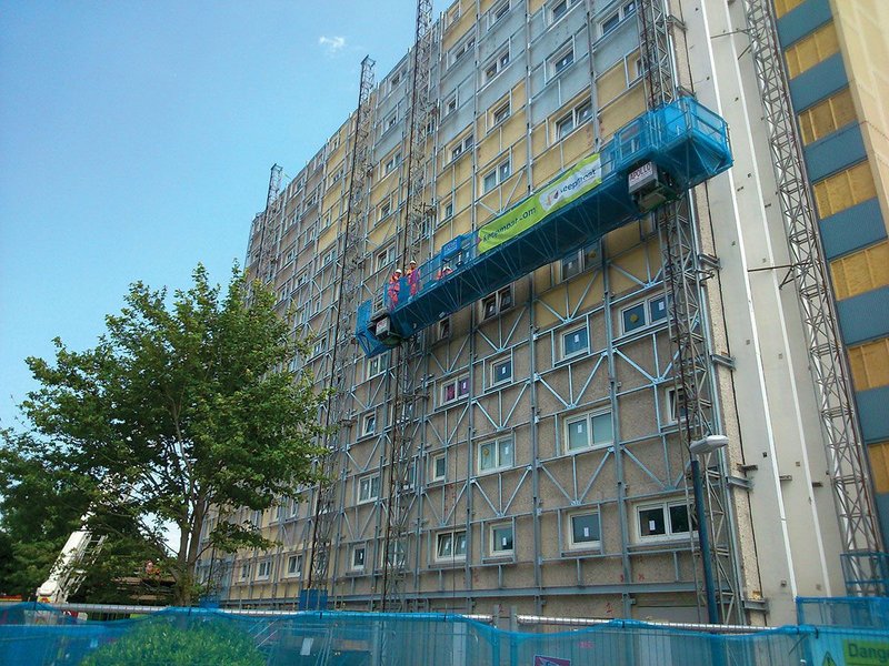 Wilmcote House mid-upgrade. A lightweight insulated frame encloses previously open corridors.