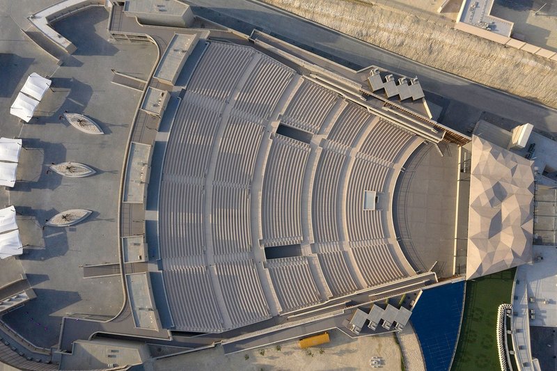 Aerial view of the Al Dana Amphitheatre in Bahrain showing stage, seating and entrance circulation.