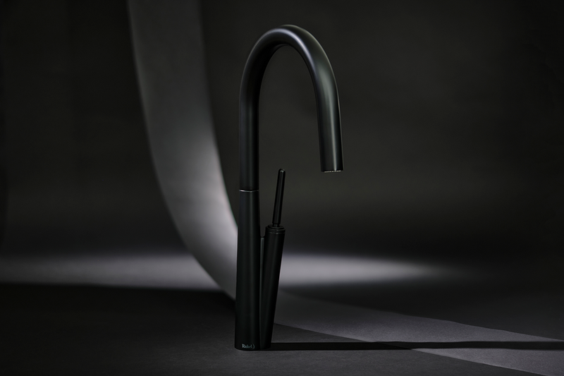 Riobel Solstice kitchen tap in Black: The spray nozzle is hidden so as not to detract from the curving spout and slender handle.