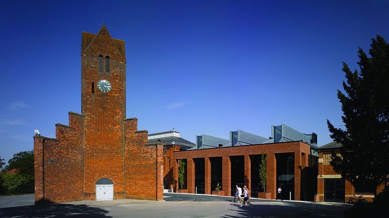 Brick contextualism: new mixed-use building works with its neighbours.