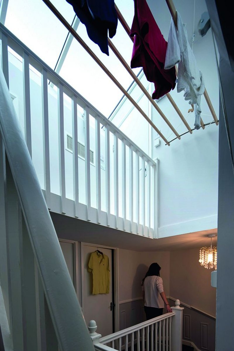 A Dutch airer instead of a tumble drier in the new attic level gives an immediate saving in running costs.