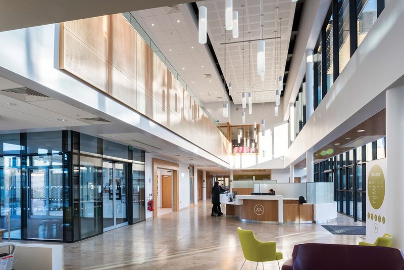 A bright, light-filled entrance sets the tone for the public’s experience of the radiotherapy unit.
