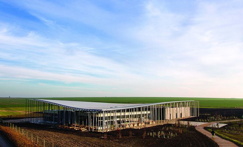 The graceful roof of the visitor centre evokes both a woodland copse and early aeroplanes.